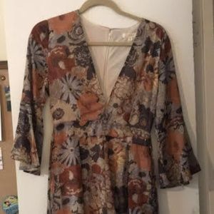 Red Dress Boutique Floral Bellsleeve Romper